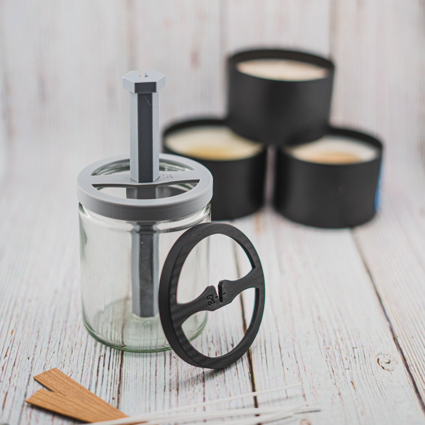 Organic Plastic candle wick centering tool positioned over a clear glass candle vessel, ensuring perfect wick alignment for even burning.